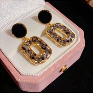 NEW. Retro Gold Geometric with Crystal Accents Dangle Earrings.